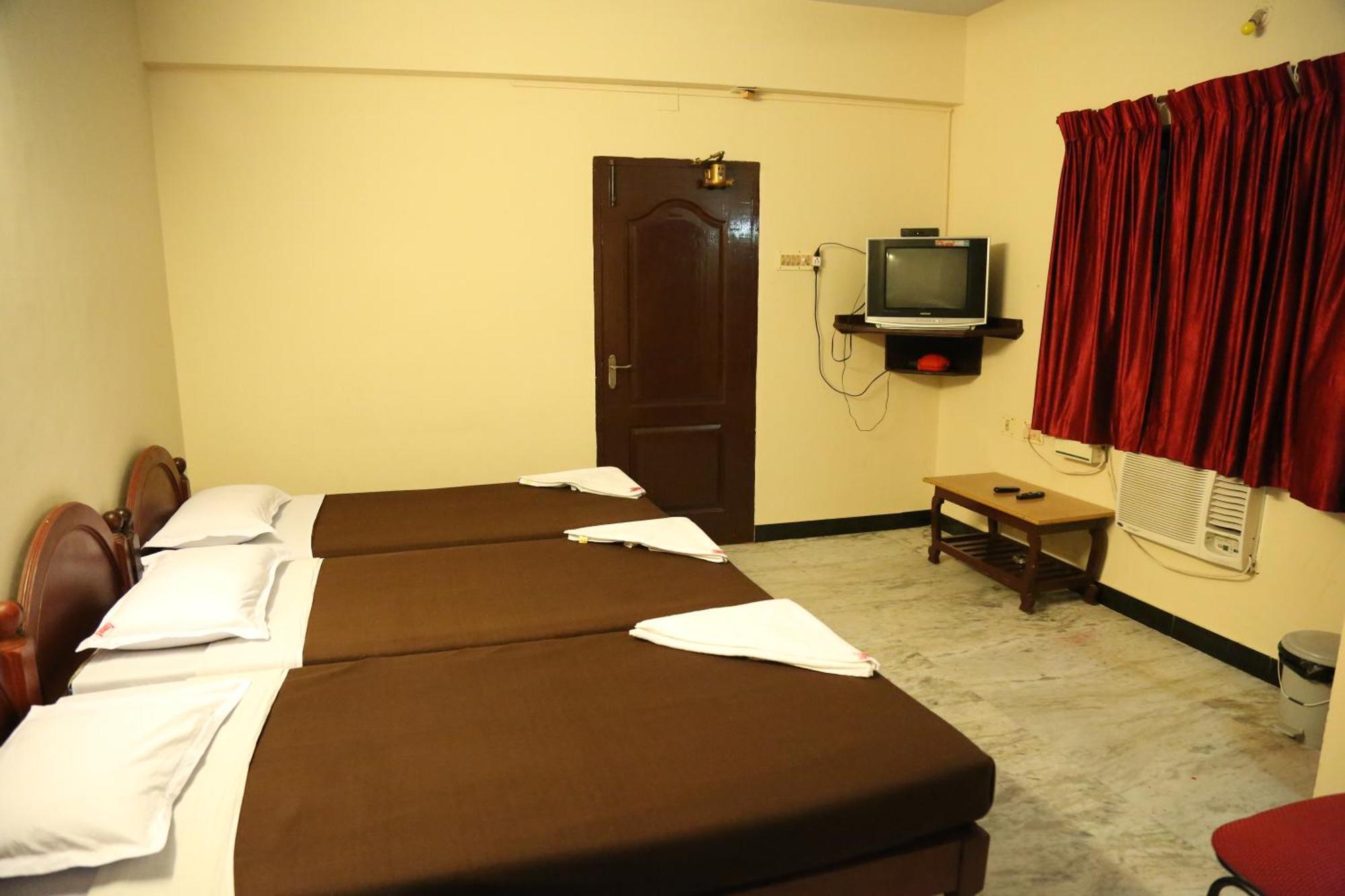 Rmc travellers inn Chennai Rom bilde