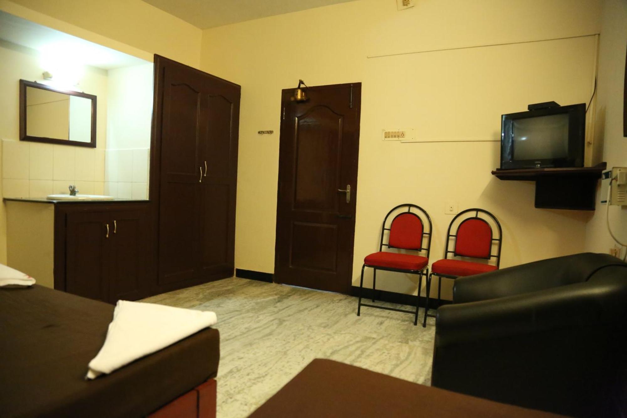 Rmc travellers inn Chennai Rom bilde
