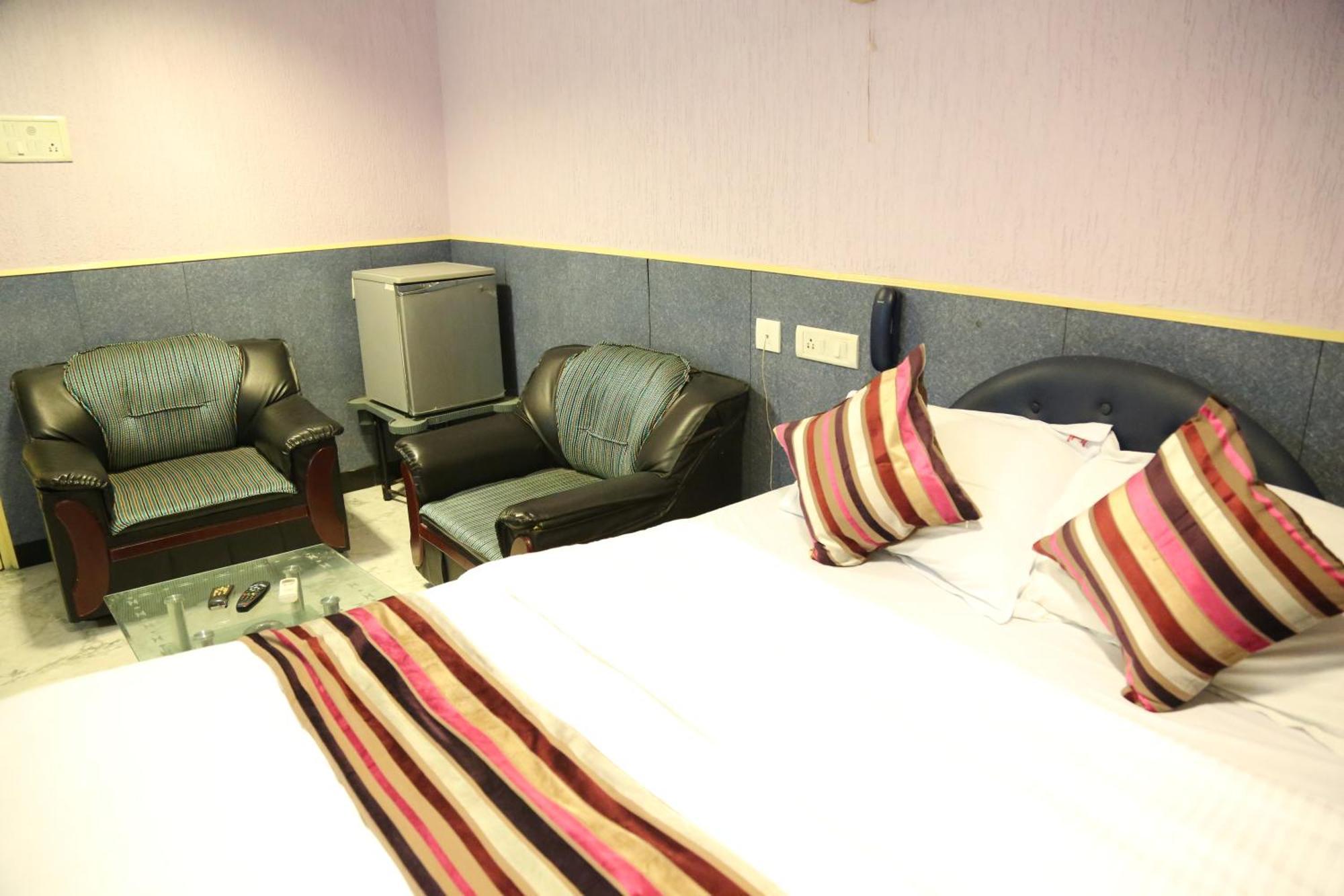 Rmc travellers inn Chennai Rom bilde