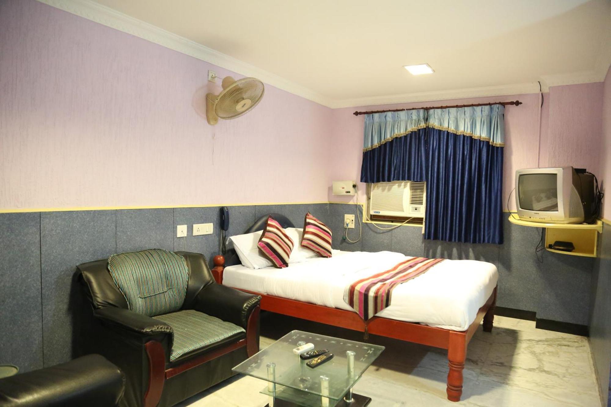 Rmc travellers inn Chennai Rom bilde