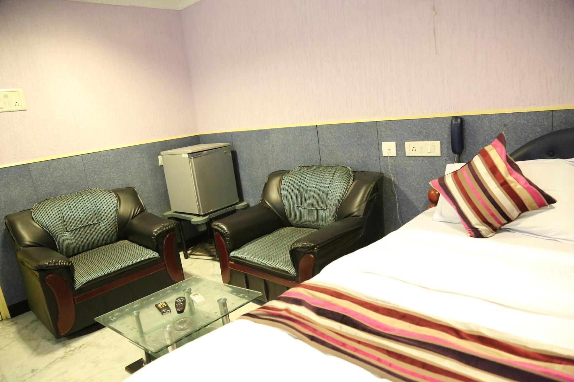 Rmc travellers inn Chennai Rom bilde